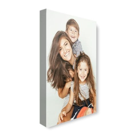 Custom canvas prints with personal photos, stretched on a 16×12 inch white portrait frame. Canvas Art Rocks.