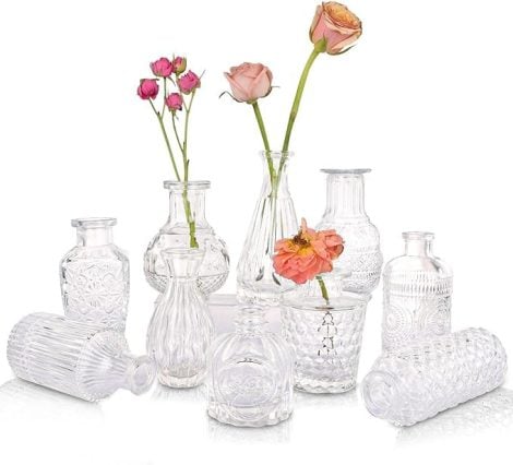 Set of 10 small clear glass bud vases with embossed design, perfect for weddings, parties, and home décor.