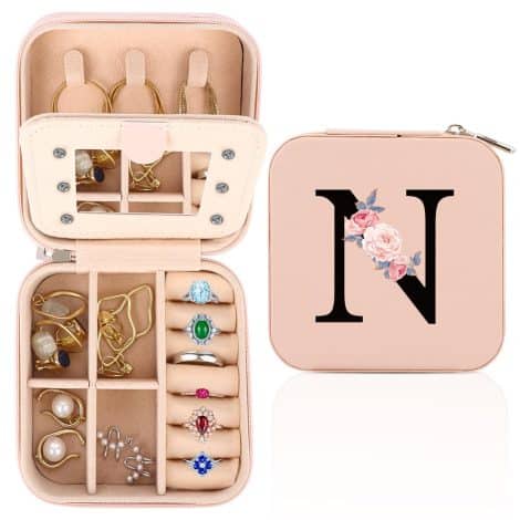 Compact travel jewellery box with mirror, perfect for organising your precious items. Ideal gift for women.