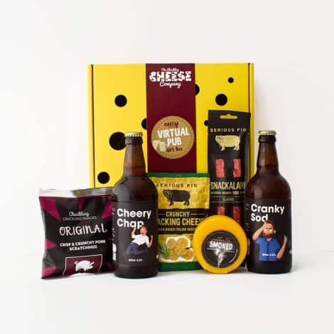 Pub-inspired food gift box filled with tasty snacks, cheese, and beer – a perfect gift for anyone.