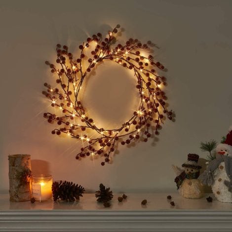 EAMBRITE Red Frosted Holly Berry Garland adds festive charm with warm white lights. Perfect for home and garden.