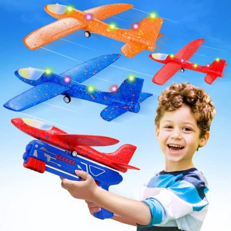 Toy planes and launcher set for boys aged 3-6, perfect for outdoor fun in gardens.