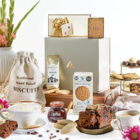 Luxurious Scottish Christmas Hamper filled with chocolates, cake, biscuits, artisan tea, and coffee. Perfect gourmet gift!